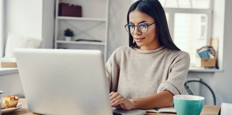 10 Ways To Bounce Back After Being Let Go From Your Job woman on computer