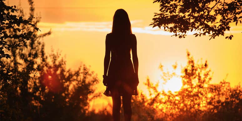 woman alone in sunset
