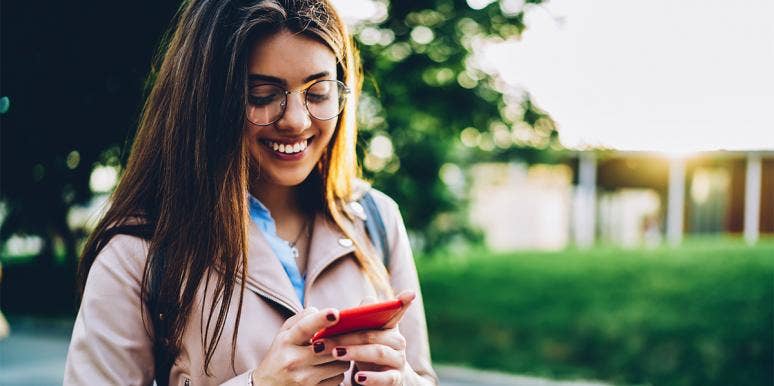 3 Most Common Lies People Tell Before A First Date woman texting
