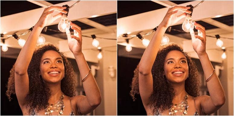life after divorce woman turning on bright light
