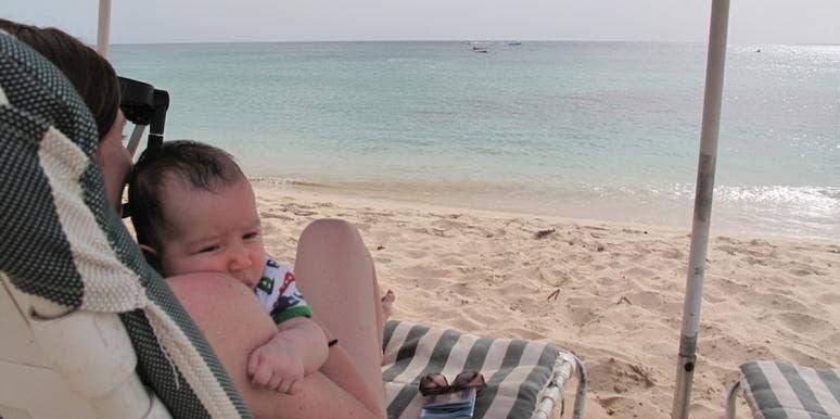How Living On A Tropical Island Changed My Parenting Style woman and child on the beach