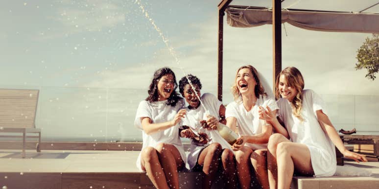 Why You Should Spend College Looking For Your Bridesmaids, Not Your Husband bride and bridesmaids popping champagne