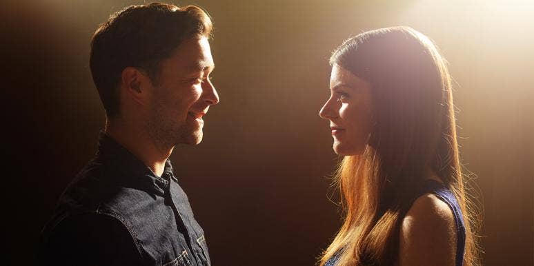 How Men Can Tell If You're Faithful Just By Looking At You woman and man looking at each other