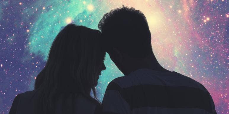 45 Powerful Love Affirmations From TikTok & The Law Of Attraction couple cuddling under the stars