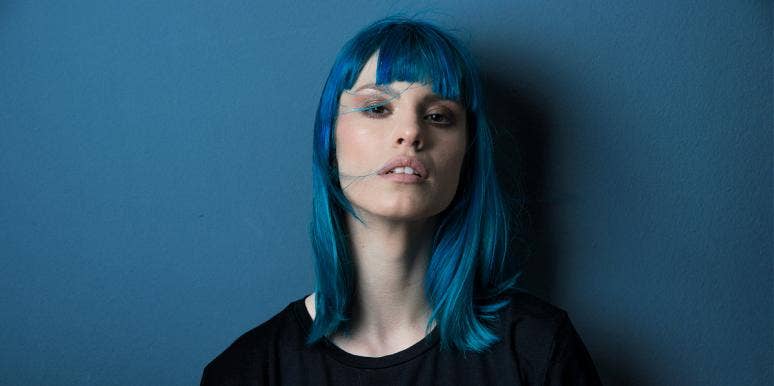 What It Was Like To Love Someone Who Made Me Hate My Body woman with blue hair sad upset