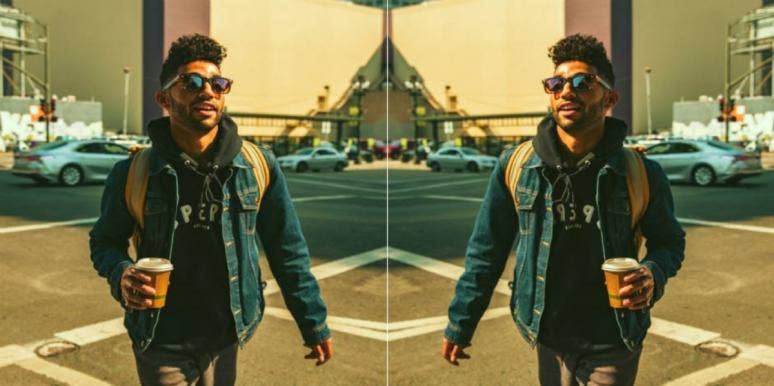 What It Means If A Man Has Low-Hanging Testicles man carrying coffee with sunglasses walking