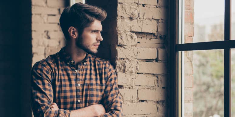 Man Calls Cops On Fiance After She Was Late Coming Home Man looking out window
