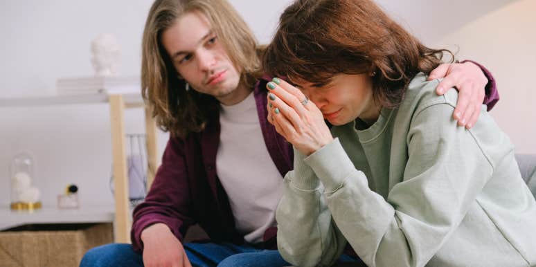 Woman Says She Can't Stand Husband Spending Time With Friend’s Widow Man comforting woman