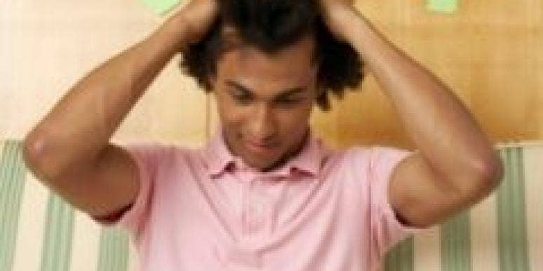 Online Dating: 7 Reasons She's Not Responding man with hands on head and laptop