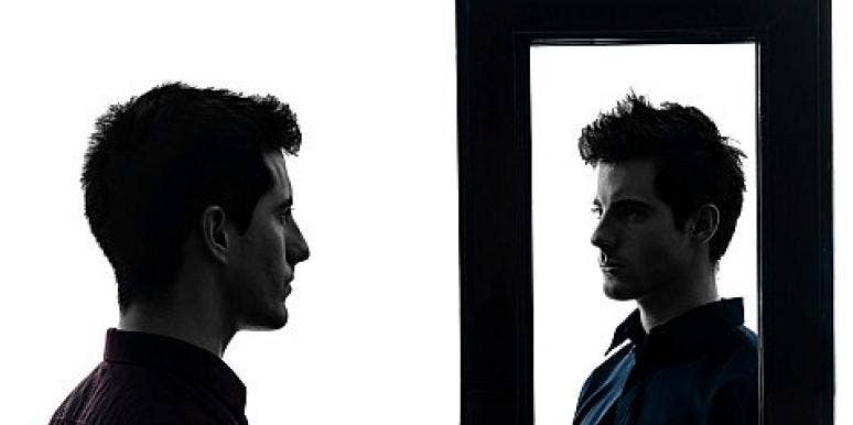 man looks in mirror man looks in mirror