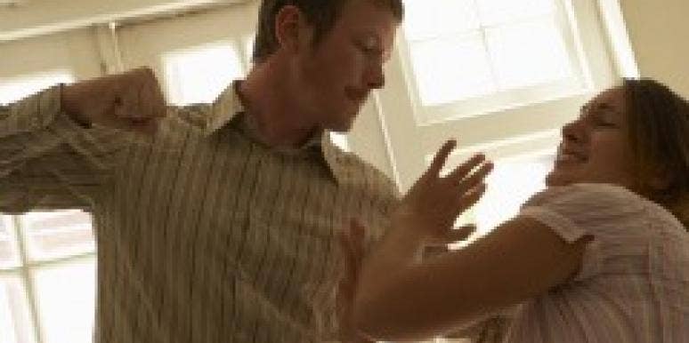 How To Avoid An Abusive Relationship Man with fist raised to hit woman