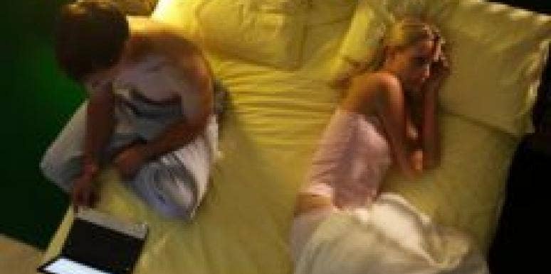 The Pros And Cons Of Lying To Your Spouse couple in bed