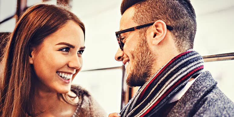 Manipulation can be good for relationships Couple in relationship looks at one another outdoors