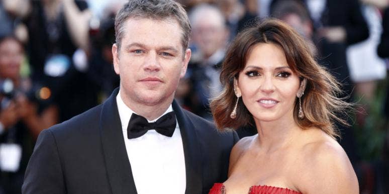 Matt Damon in tux, Luciana Barroso in a red strapless dress