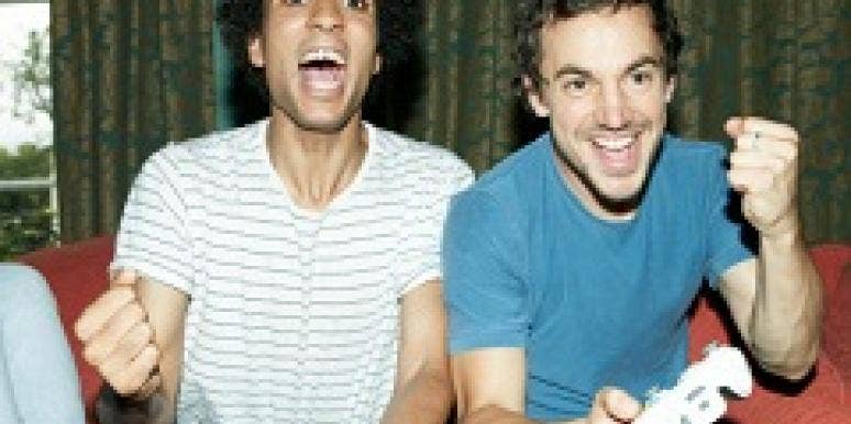 Men playing video games Men playing video games