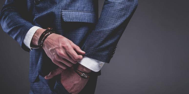 Guys, We Seriously Can't Date You When You're Wearing This Outfit man adjusting cuffs