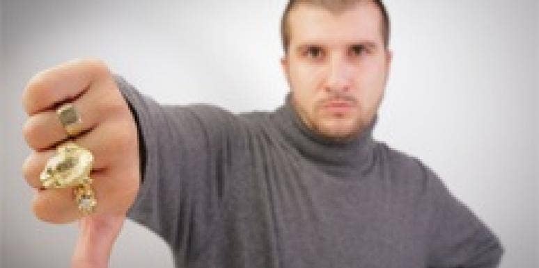 First Date Advice: 5 Things Men Shouldn't Wear thumbs down from a man wearing a turtleneck and gold rings