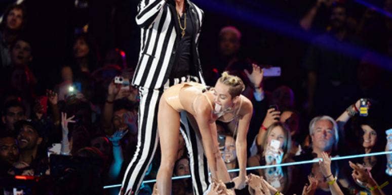 Robin Thicke grinding on a twerking Miley Cyrus at the 2013 MTV VMAs