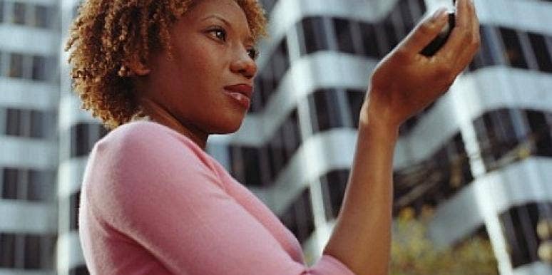 woman looking in miror