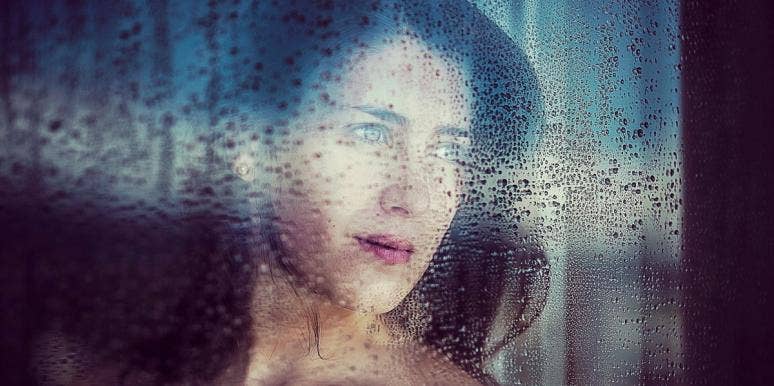 missing narcissistic ex sad woman looking out the window