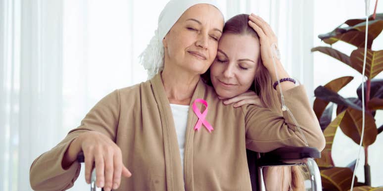 daughter hugging mom with cancer