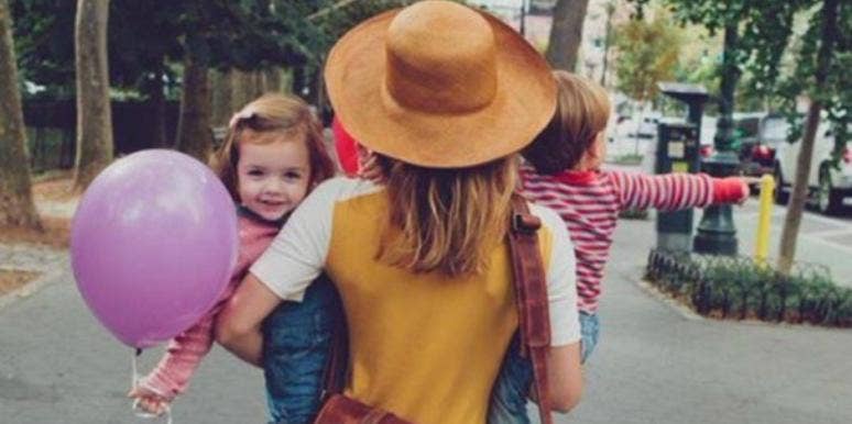 mom holding kids mom holding kids