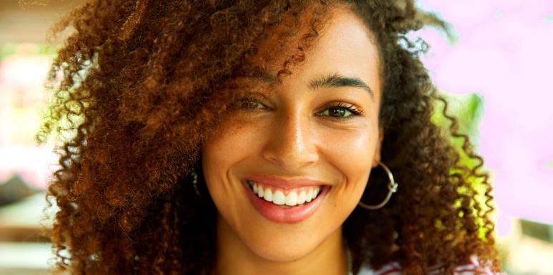 The Most Faithful Zodiac Signs In Astrology, Ranked From Most To Least woman smiling