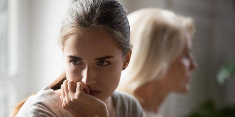 Woman Wonders If She’s Wrong For Refusing To Invite Mom Wedding Dress Shopping Because Of Something She Said Years Ago mother and daughter sitting back to back after fight