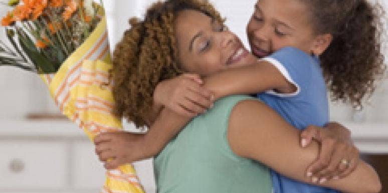 9 Fabulous Mother's Day Ideas mother daughter hugging flowers