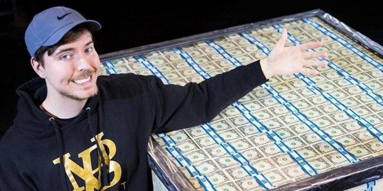 MrBeast posing with money for a video giveaway