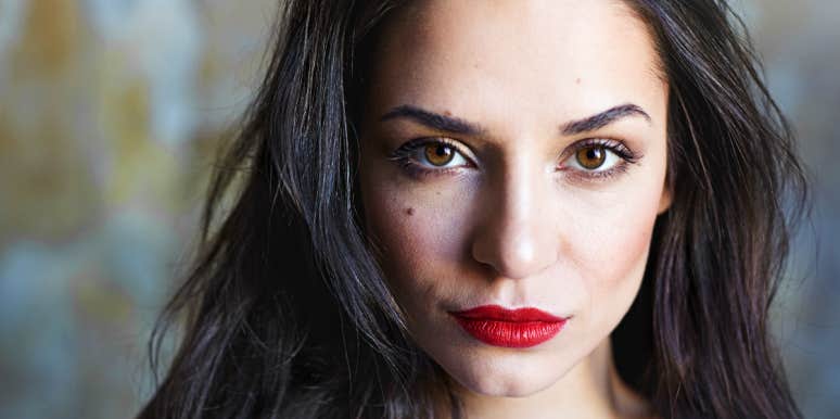 Mutual abuse Strong woman looks at camera