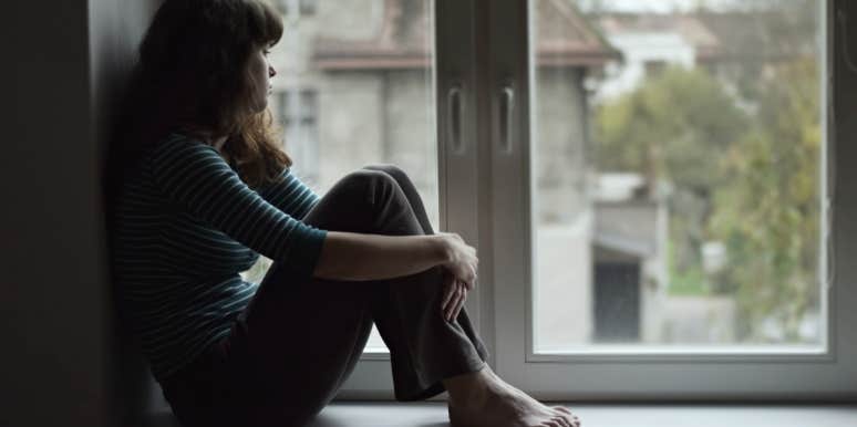 What I Want My Friends And Family To Know About My Eating Disorder woman by window