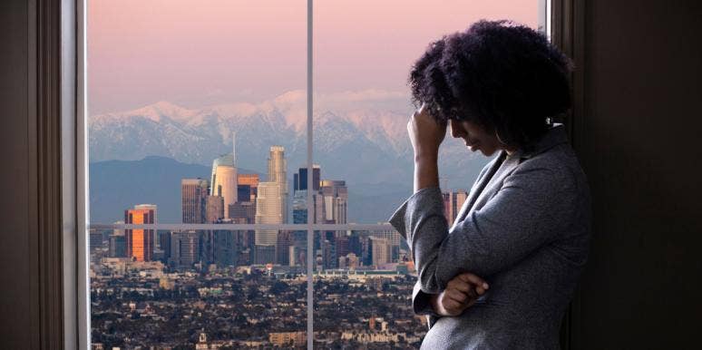 To My Ex-Lover That I Can't Move On From sad woman in front of city