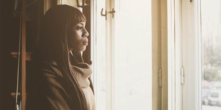 My House Burned Down in December. I Lost My Job in January. Here's What I Learned. woman looking out window
