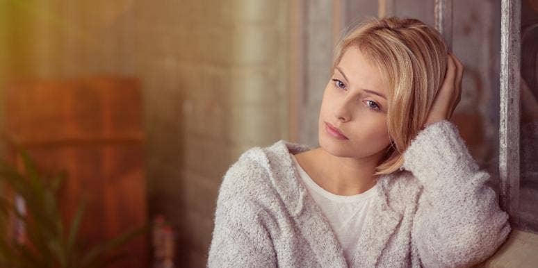 What Is Hoovering? 12 Signs You're A Victim Of A Hoovering Narcissist (And How To Get Help) sad woman in her room