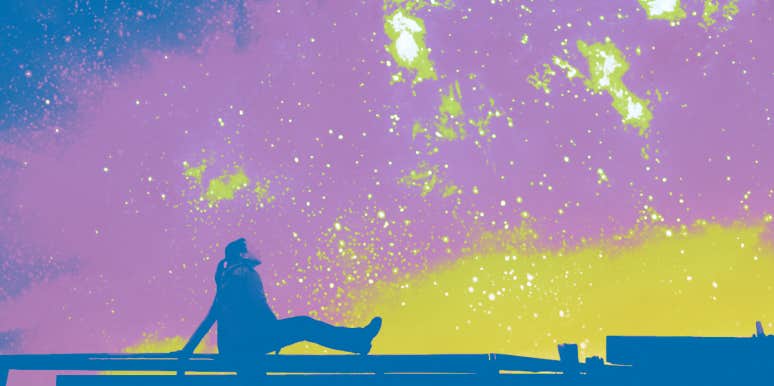 How To Find NASA's Astronomy Picture Of The Day For Your Birthday woman looking up at the night sky