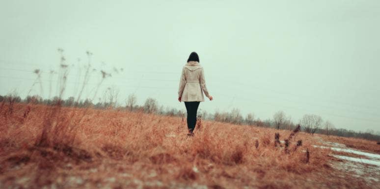 This Is My Goodbye To You I Never Got To Say woman in a field walking away