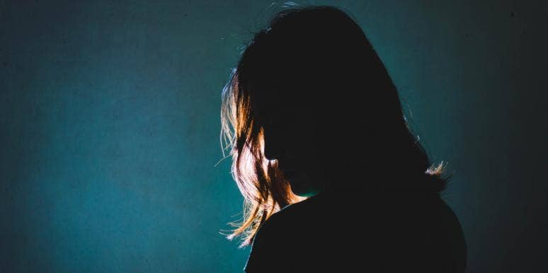 Why You Should Never Go Back To What Broke You sad woman turned away