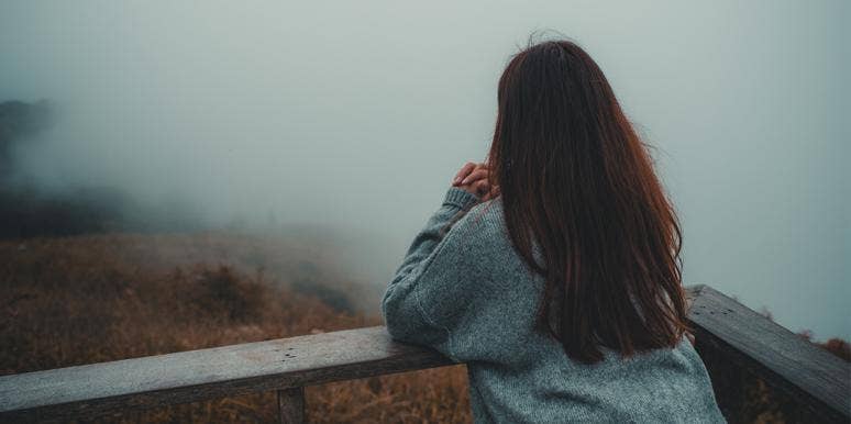 The Mormon Religion Rejects Me Because I Have No Desire To Be A Wife woman looking out at fog