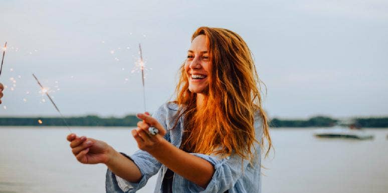 12 New Year's Resolutions For Singles In 2021 single woman on new years eve