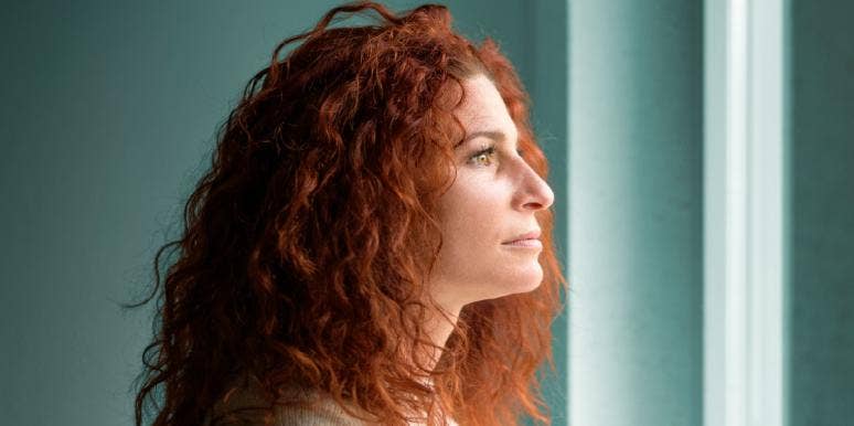Always The Bridesmaid, Never The Maid Of Honor: What It's Like To Have No Best Friend lonely woman looking out the window
