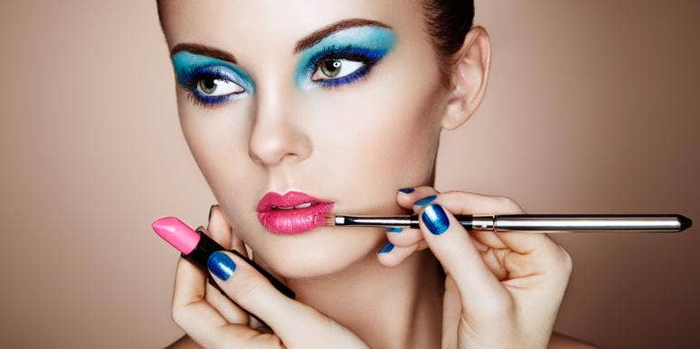 7 Beauty Myths Secretly Ruining Your Love Life woman putting on makeup