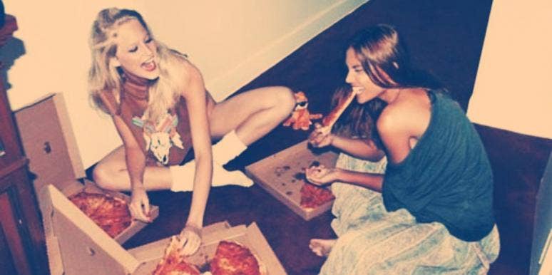 girls eating pizza