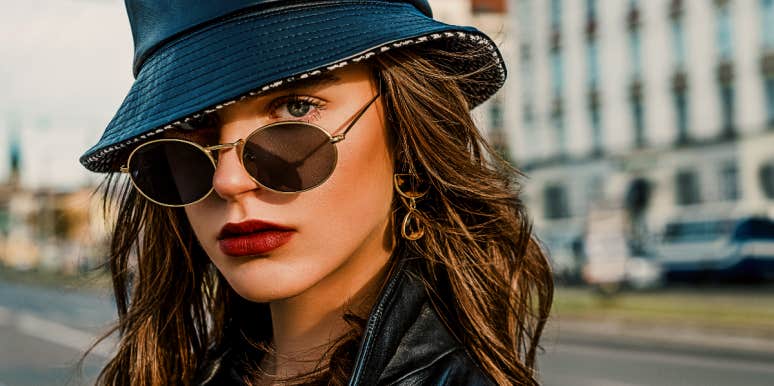 Not In Love Woman in black leather hat