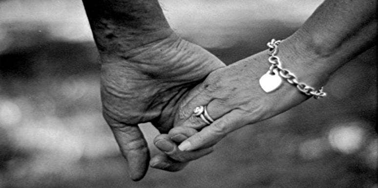 couple holidng hands couple holding hands