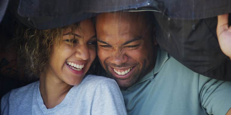 woman laughing with man