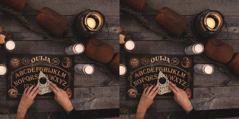 hands on planchette and ouija board