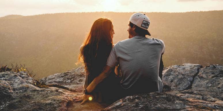 Couple watching sunset Couple watching sunset