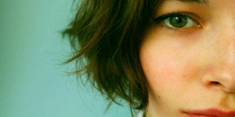 How To Know If Something's Wrong With Your Relationship — Or If It's Just You Close up of woman's face