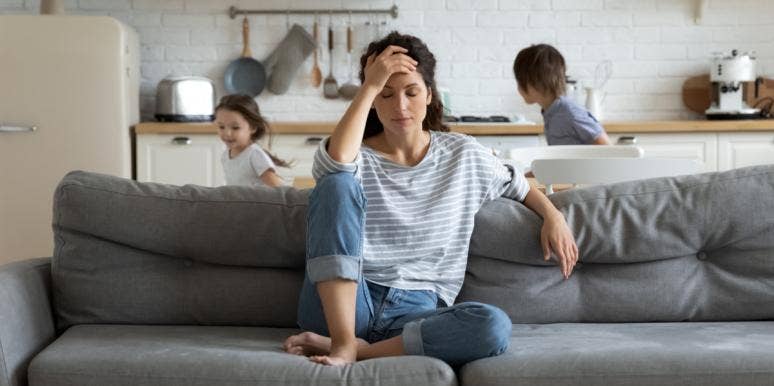 The Real Reason Parents Are More Exhausted Than You Think They Should Be woman frustrated